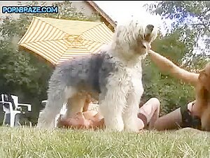 Saucy Redhead Gets Wild Romp from Shaggy Dog Lucky in Free Animal Porn Clip!